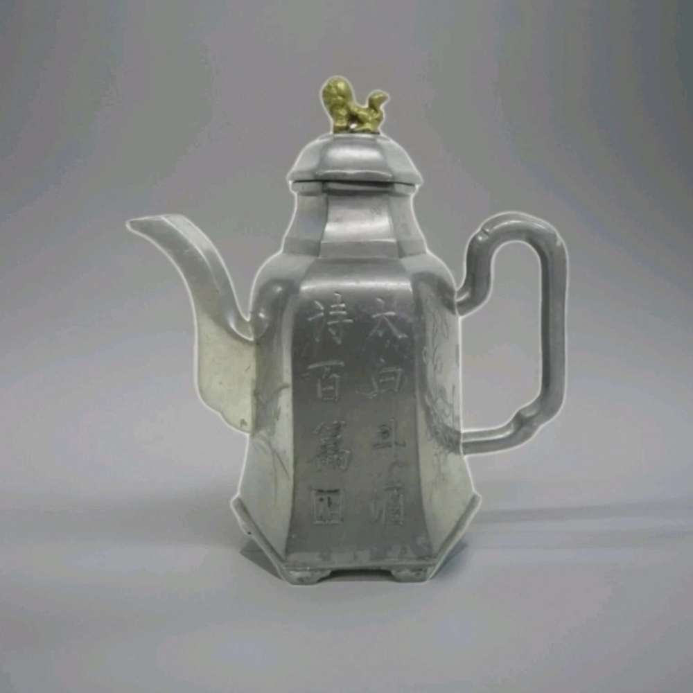 Qing Dynasty Pewter Teapot with Gold Lion